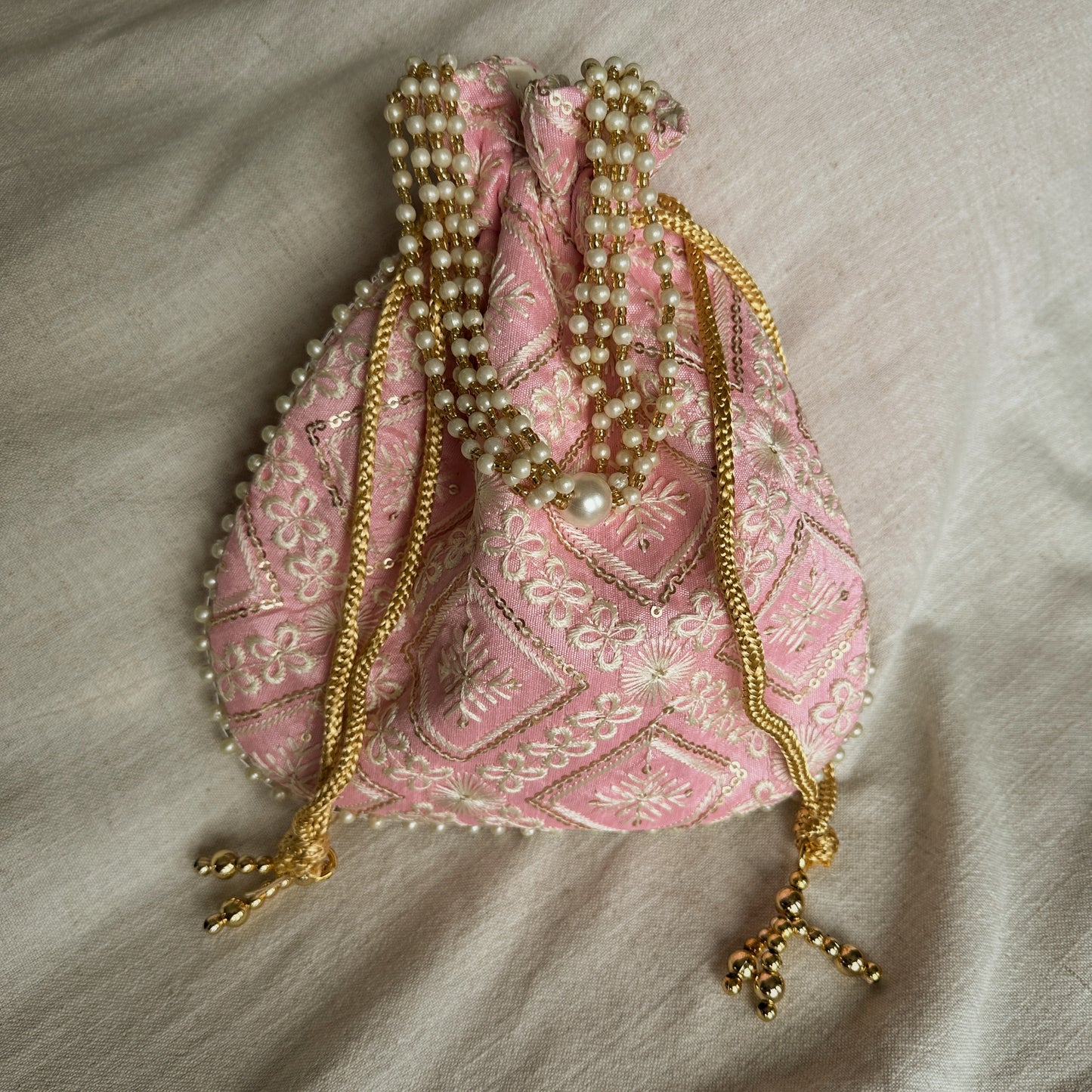 Intricate Chikankari Embroidered Potli Bags