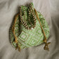 Intricate Chikankari Embroidered Potli Bags